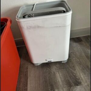 White electric trash can